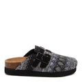 Abel Plus Black Tatum Clogs black casuals side view showing two black buckle straps, tan footbed and black sole