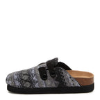 Abel Plus Black Tatum Clogs black casuals side view showing open-back clog shape, patterned upper and straps