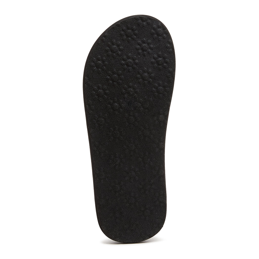 Black outsole of the Rocket Dog Adios light blue leopard print flip flop