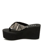 Inner side of the Crush tan animal print flip flop