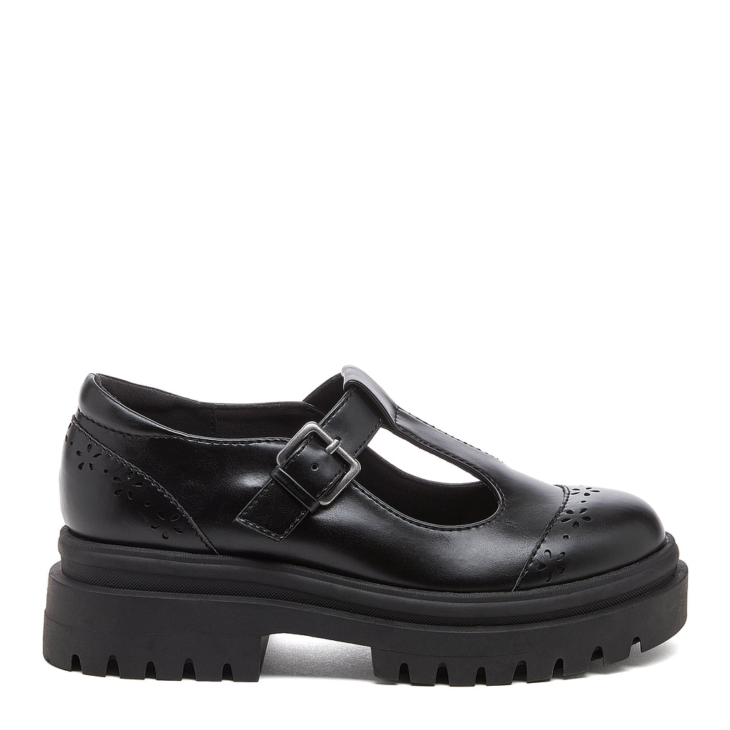 Image 4: Dalma Black Chunky Mary Jane Shoes in black, outer side view showing buckle detail, flower cut-outs and chunky sole