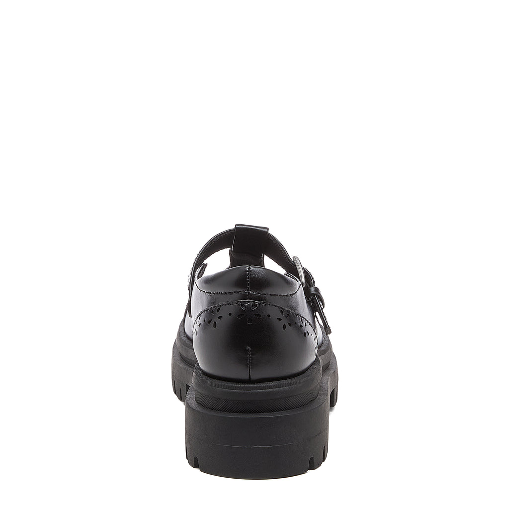 Image 8: Dalma Black Chunky Mary Jane Shoes in black, back view showing heel cut-out detailing and chunky sole