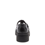 Image 8: Dalma Black Chunky Mary Jane Shoes in black, back view showing heel cut-out detailing and chunky sole