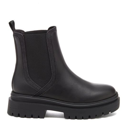 Drake Black Boots black boots outer side view showing Chelsea boot shape, side elastic panel, back pull tab and chunky treaded sole