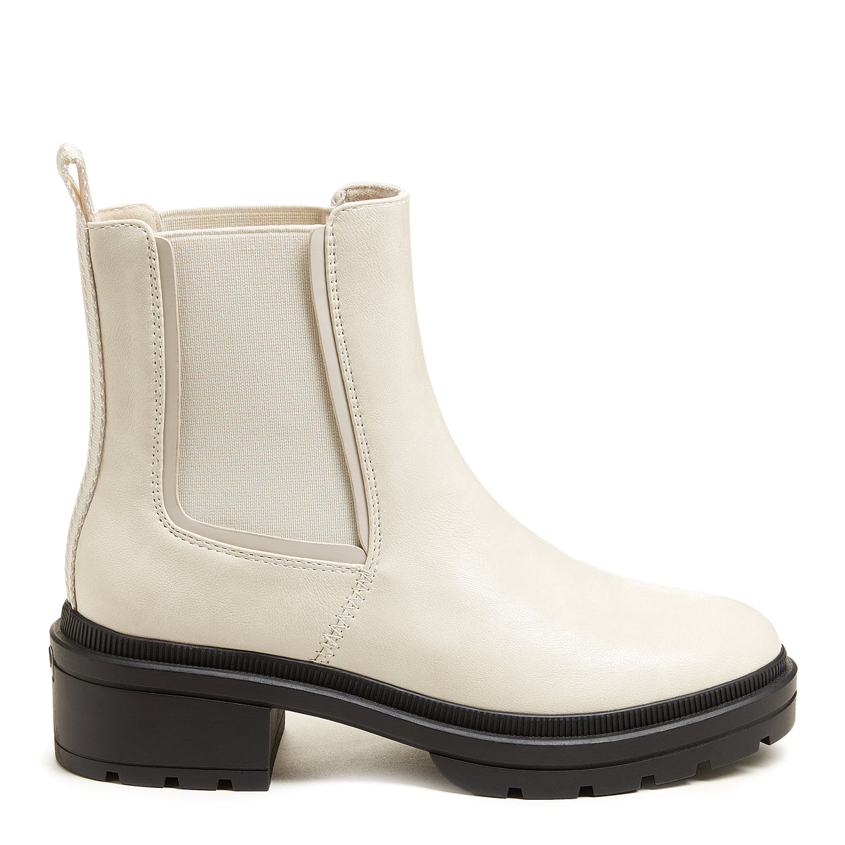 A pair of women's faux leather Chelsea boots in a bone white colour with white elastic panels and a low black heel.