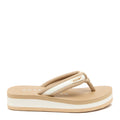 Side view of the Rocket Dog Monica tan flip flop, tan strap on a tan platform