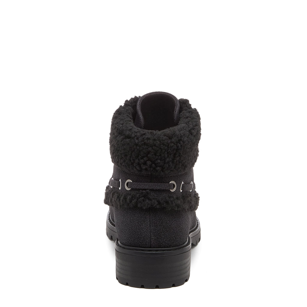 Nixie Black Boots in black, rear view showing furry textured cuff, side lace detail and treaded heel.