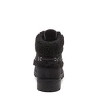 Nixie Black Boots in black, rear view showing furry textured cuff, side lace detail and treaded heel.