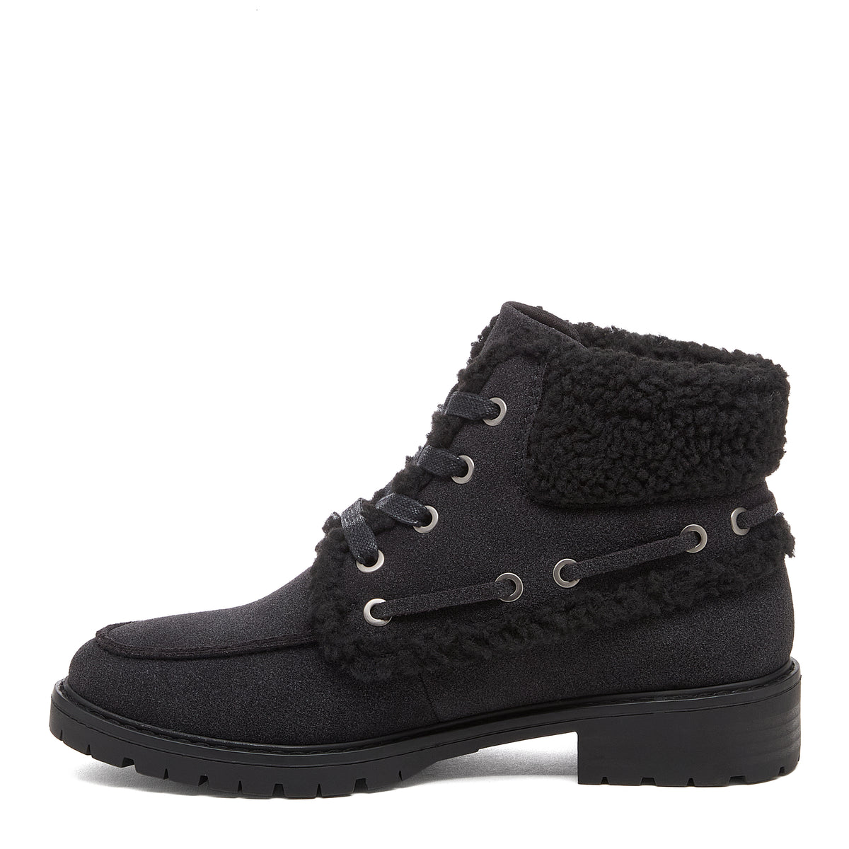 Nixie Black Boots in black, side profile showing ankle boot shape, textured cuff, side lace detail and treaded sole.