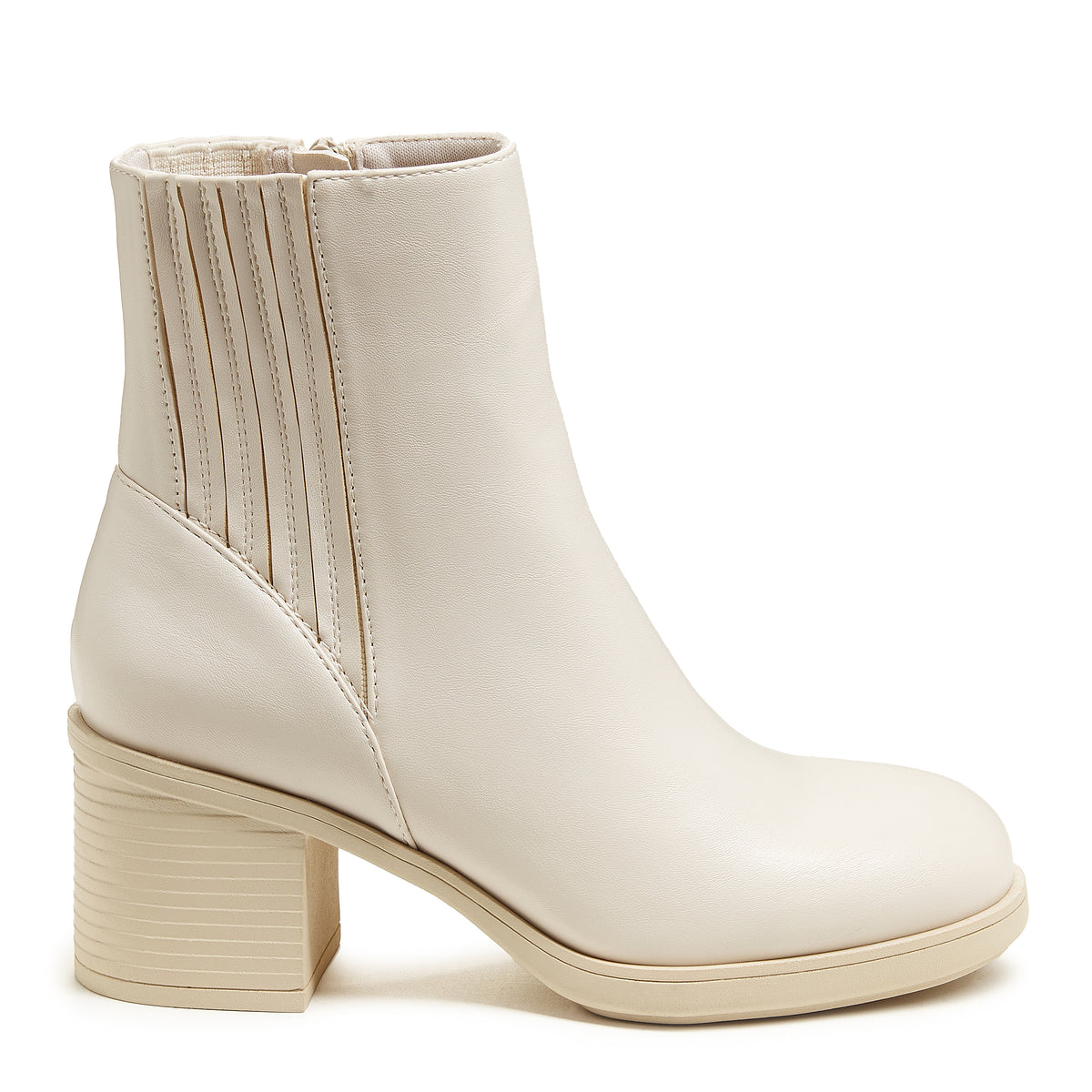 A stylish bone faux leather Chelsea boot with a chunky heel and platform sole, featuring a zipper closure.