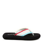 Side view of the Rocket Dog Spotlight white waves flip flop, white wave print strap on a black platform