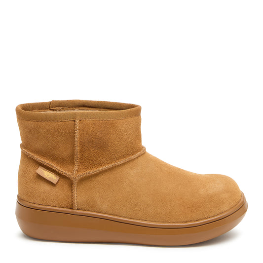 A slip-on style camel suede ankle boot with a short shaft and chunky rubber sole.
