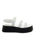 Side view of the Rocket Dog Dover white platform sandal, white multi-strap upper on a chunky black platform