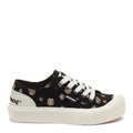 Side view of the Rocket Dog Jazzin Plus black daisy print platform trainer, black canvas with white daisy print