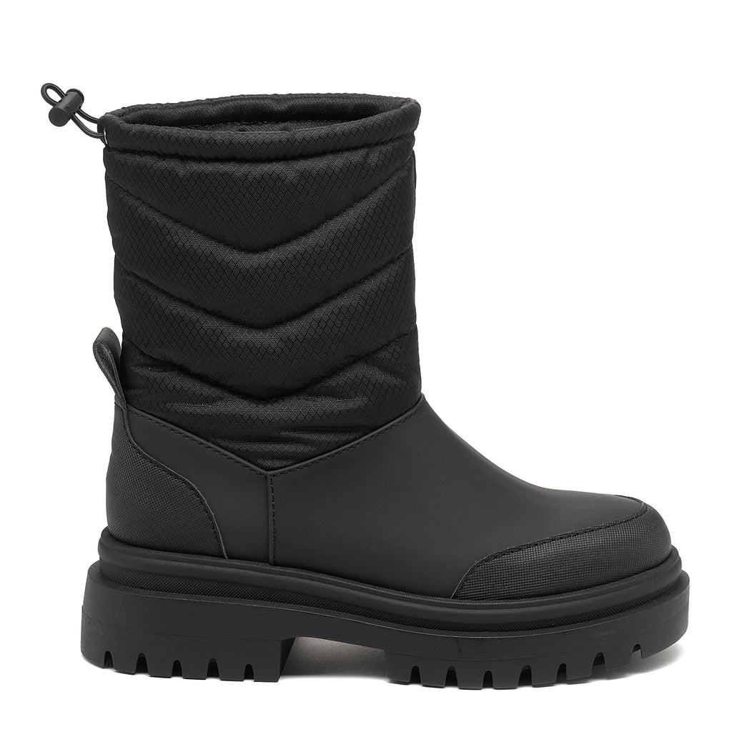 Dita Black Winter Boot black boot outer side view with quilted shaft, collar toggle and textured toe panel