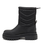 Dita Black Winter Boot black boot side view with quilted shaft, smooth lower panel and chunky treaded sole