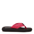 Side view of the Rocket Dog Spotlight Pink Crochet flip flop, pink crochet strap on a black platform